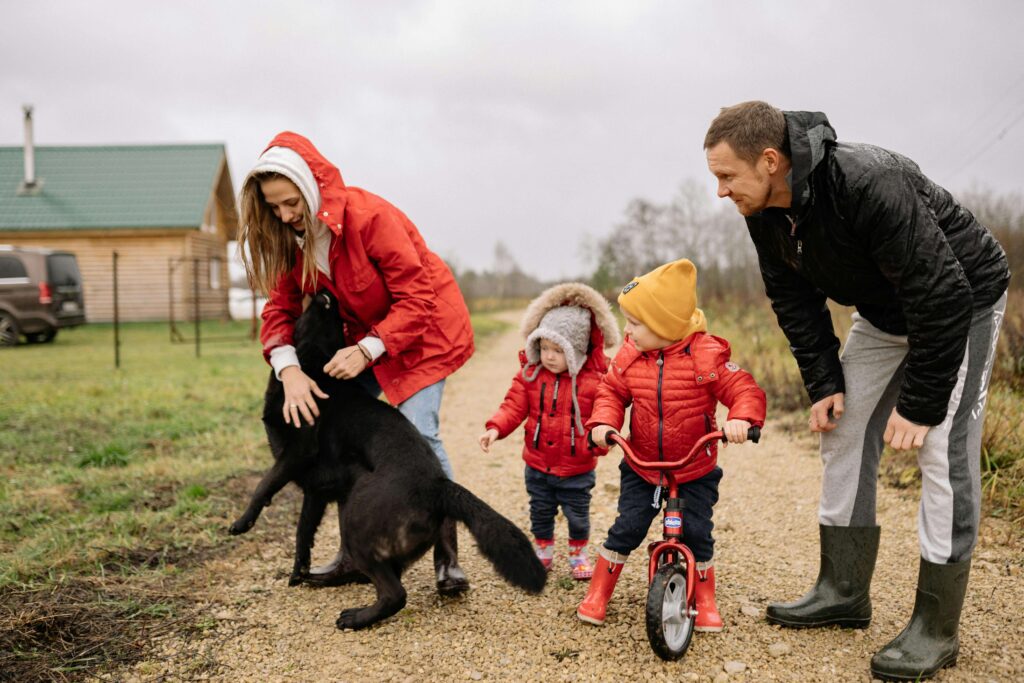 happy family with their dog best dog breeds for families